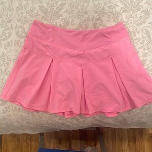 Set of TWO Ivivva by Lululemon Tennis Skirts (one purple, one pink)